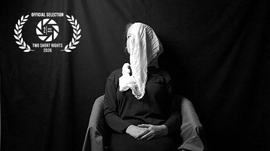 Still image of a seated woman from the porous body film